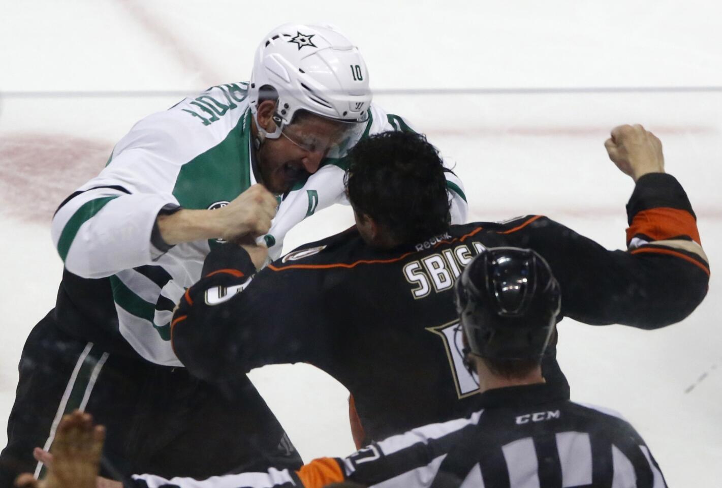 Ducks defenseman Luca Sbisa fights Stars center Shawn Horcoff near the end of the third period of Game 5 on Friday night at Honda Center in Anaheim.
