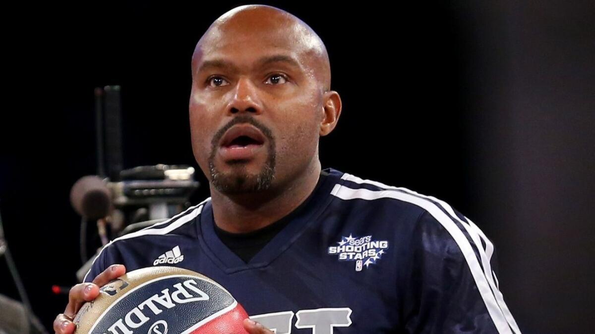 Tim Hardaway prepares his shot during the shooting stars competition at the 2014 NBA All-Star weekend in New Orleans.