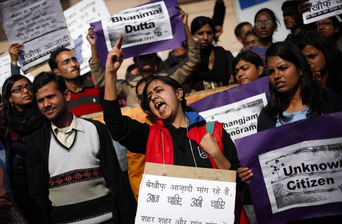 Demonstrators protest gender discrimination and sexual violence Saturday in New Delhi. The rape and killing of a 23-year-old student has galvanized protesters.