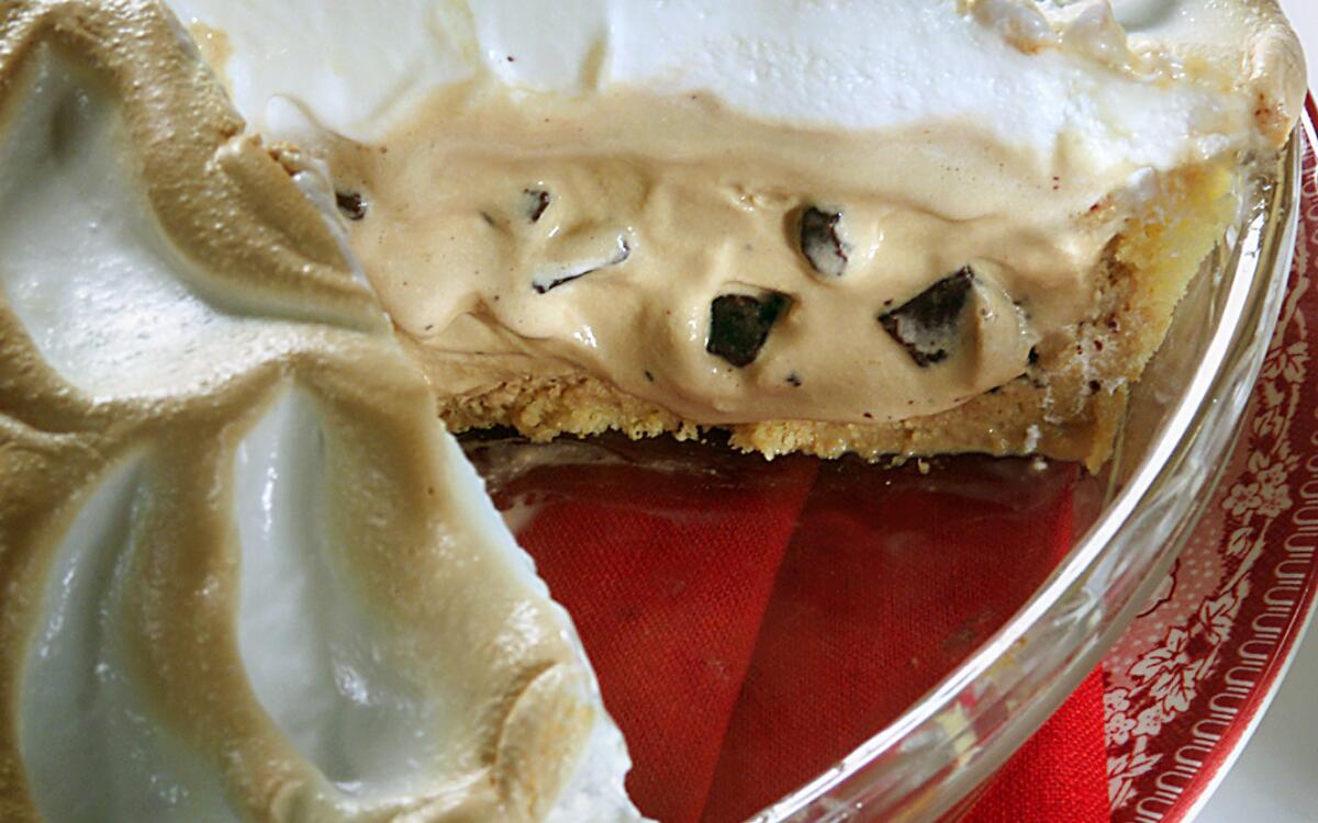 Baked Alaska Coffee Ice Cream Pie with a wedge removed