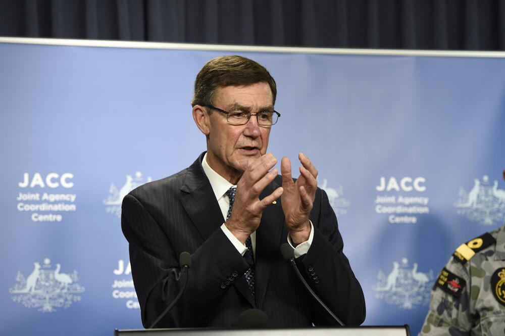 Retired Air Chief Marshal Angus Houston attends a press conference to update the media with the latest information on missing Malaysia Airlines Flight MH370 on April 14 in Perth, Australia.