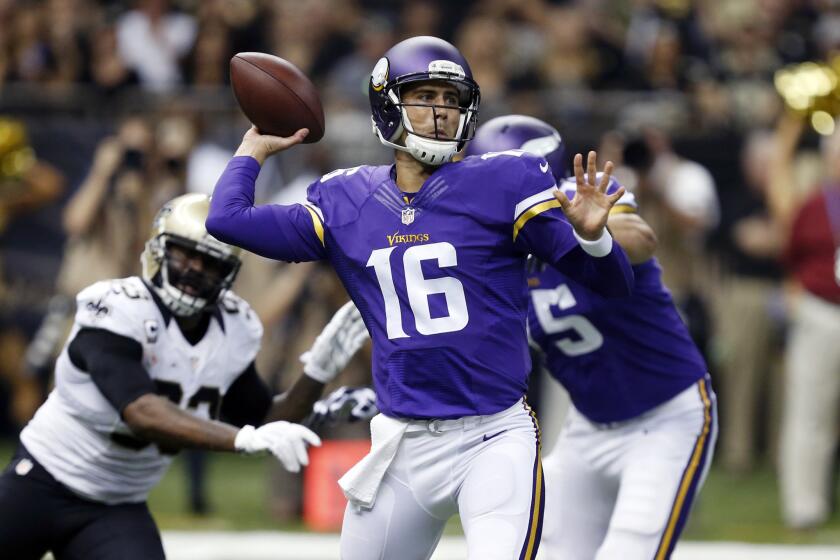 Minnesota Vikings quarterback Matt Cassel (16) makes a pass against the Saints during their game Sunday in New Orleans.