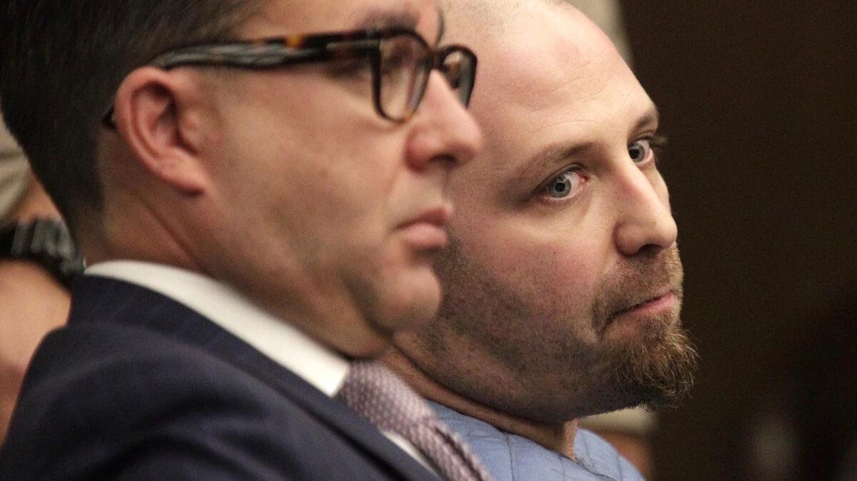 ALHAMBRA CA AUGUST 23, 2017 -- Aramazd Andressian Sr., right, sits with his lawyer, Ambrosio Rodriguez, in an Alhambra courtroom Wednesday August 23, 2017, where he was was sentenced to 25 years to life in prison for murdering his 5-year-old son after a trip to Disneyland earlier this year. (Irfan Khan / Los Angeles Times)