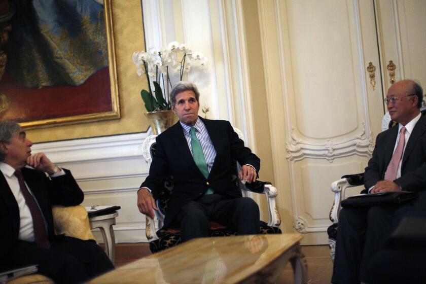 Secretary of State John F. Kerry, center, and Energy Secretary Ernest J. Moniz, left, hold talks with International Atomic Energy Agency Director-General Yukiya Amano in Vienna on Monday.
