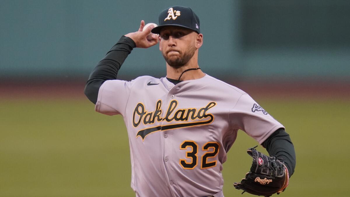 Oakland Athletics pitcher James Kaprielian delivers against the Boston Red Sox on May 12.