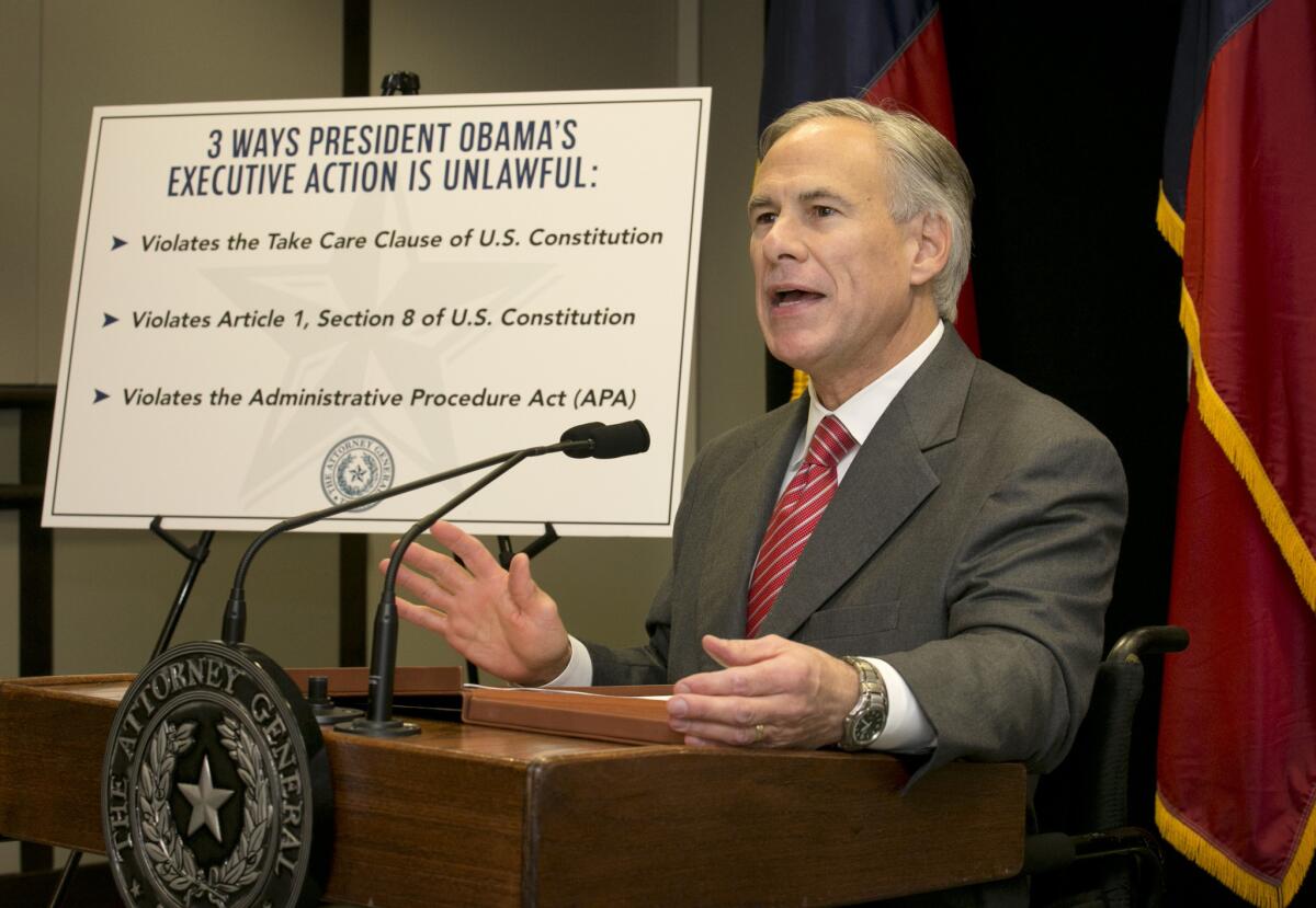 Texas Atty. Gen. and Gov.-elect Greg Abbott speaks against President Obama's executive action on immigration at the end of November. Abbott is leading a coalition of states which are challenging Obama's executive action.