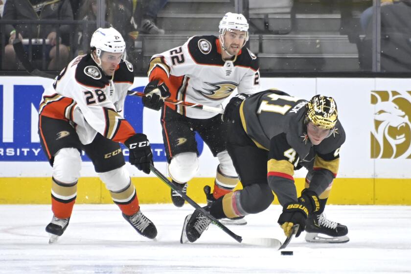 Vegas Golden Knights center Nolan Patrick (41) reaches for the puck against Anaheim Ducks.