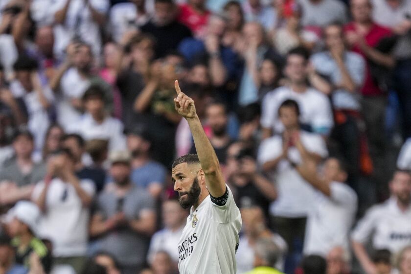 Real Madrid's Karim Benzema celebrates after scoring during the Spanish La Liga soccer match against Athletic Bilbao at the Santiago Bernabeu stadium in Madrid, Sunday, June 4, 2023. (AP Photo/Bernat Armangue)