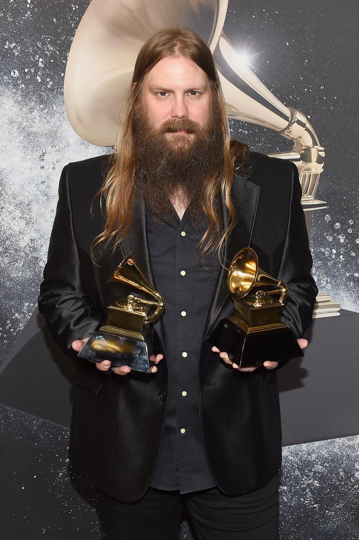 Recording artist Chris Stapleton poses backstage at the Premiere Ceremony during the 60th Grammy Awards at Madison Square Garden on Jan. 28, 2018.