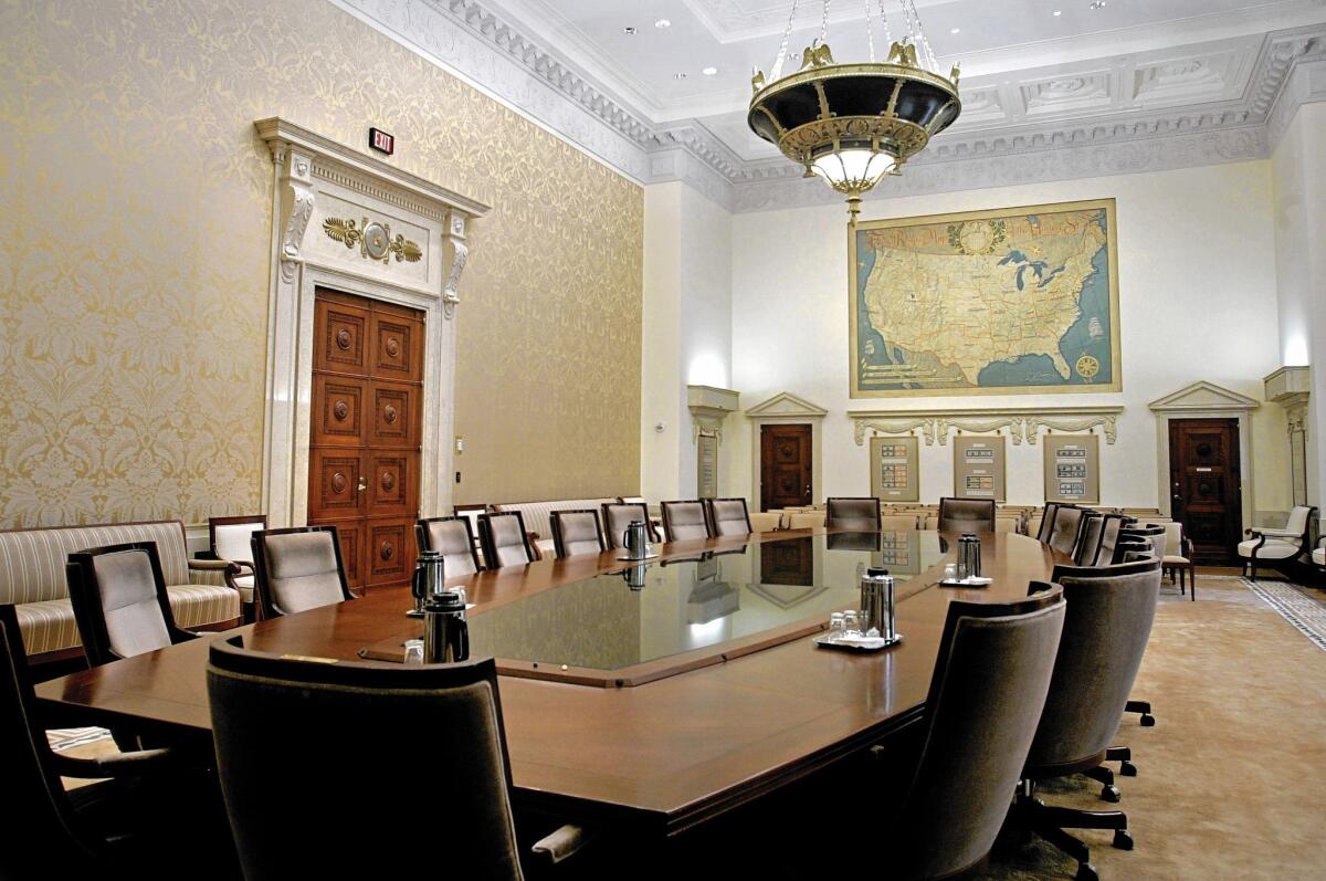 The Federal Reserve has a dual charge: maximize U.S. employment and keep prices here stable. But there’s an unwritten third mandate: financial stability. Above is the meeting room of the Fed's Board of Governors.