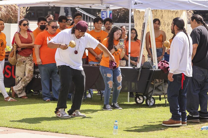 San Diego, CA - September 30: Kumeyaay Bird Singers sang and prayed and remembered boarding school children during Orange Shirt Day at SDSU on Friday, Sept. 30, 2022 in San Diego, CA. (Eduardo Contreras / The San Diego Union-Tribune)