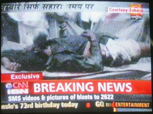 This image taken from Indian television channel CNN-IBN shows an injured man lying on a stretcher following a bomb blast in Malegaon.