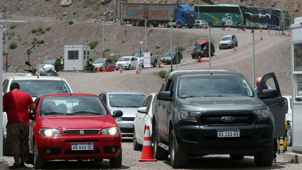 Visitors from Argentina cross the border through Los Libertadores checkpoint, at Los Andes, Chile, on Jan. 14, 2018.