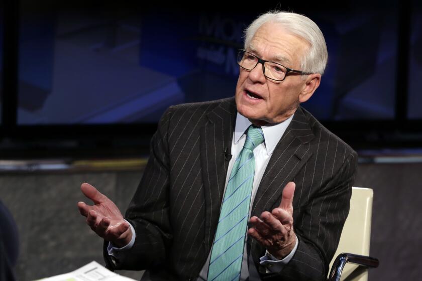 Charles Schwab, Chairman and a director of The Charles Schwab Corporation, is interviewed by Maria Bartiromo on the "Mornings with Maria Bartiromo" program on the Fox Business Network in New York, Tuesday, March 13, 2018. (AP Photo/Richard Drew)