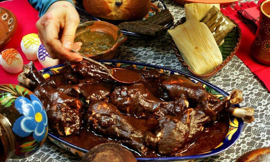 This mole is dense, with a complexity that's so subtle it seems almost secretive. The many ingredients are toasted, fried and blended, then cooked down to a paste before being thinned with turkey stock into a smooth sauce with the glossy texture of melted chocolate.