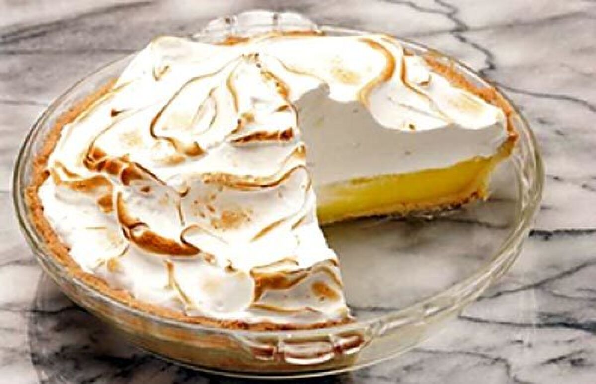 A rich lemon curd stands at the center of this terrific pie.