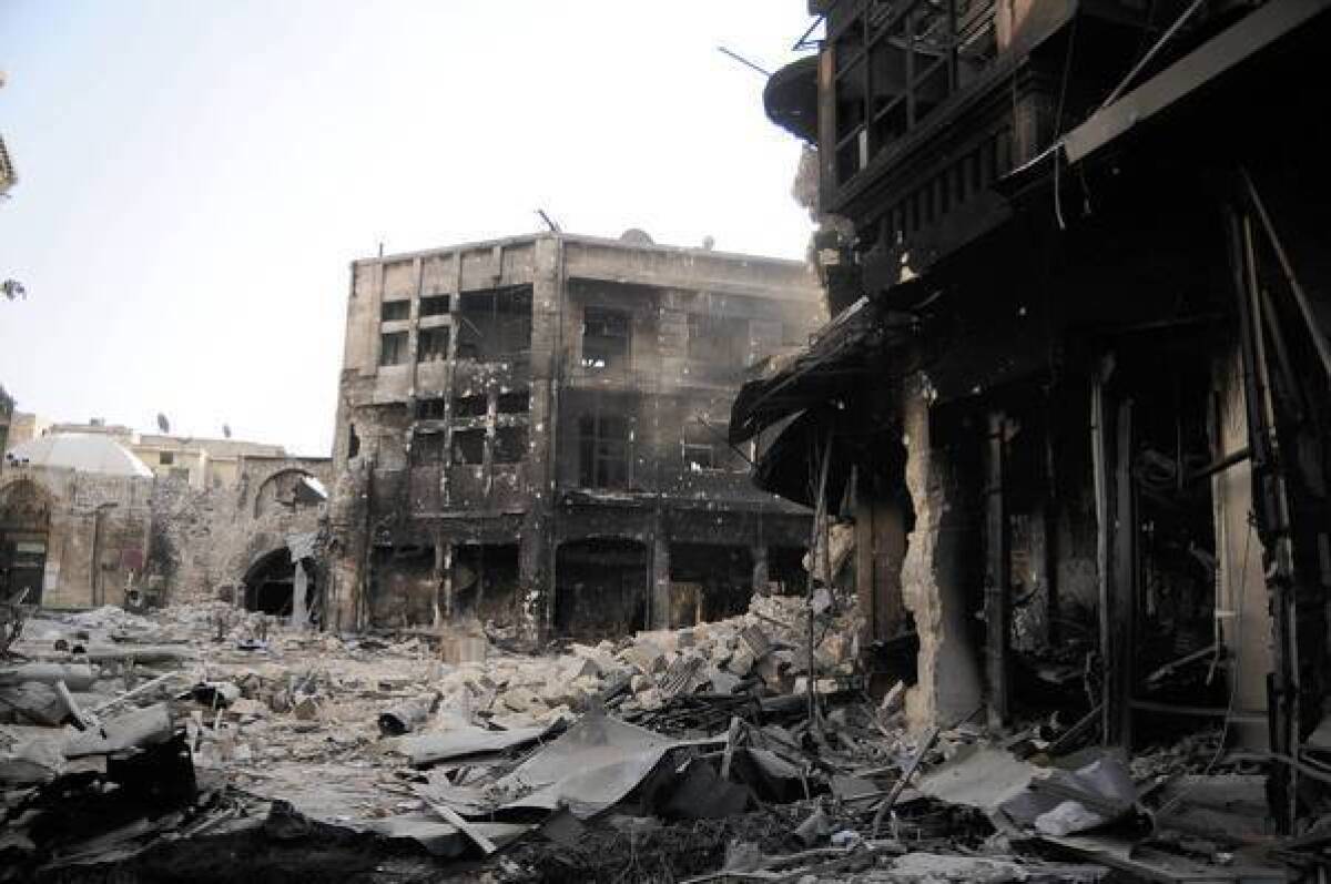 Rubble fills a street in the Old City of Aleppo, Syria, a World Heritage Site.