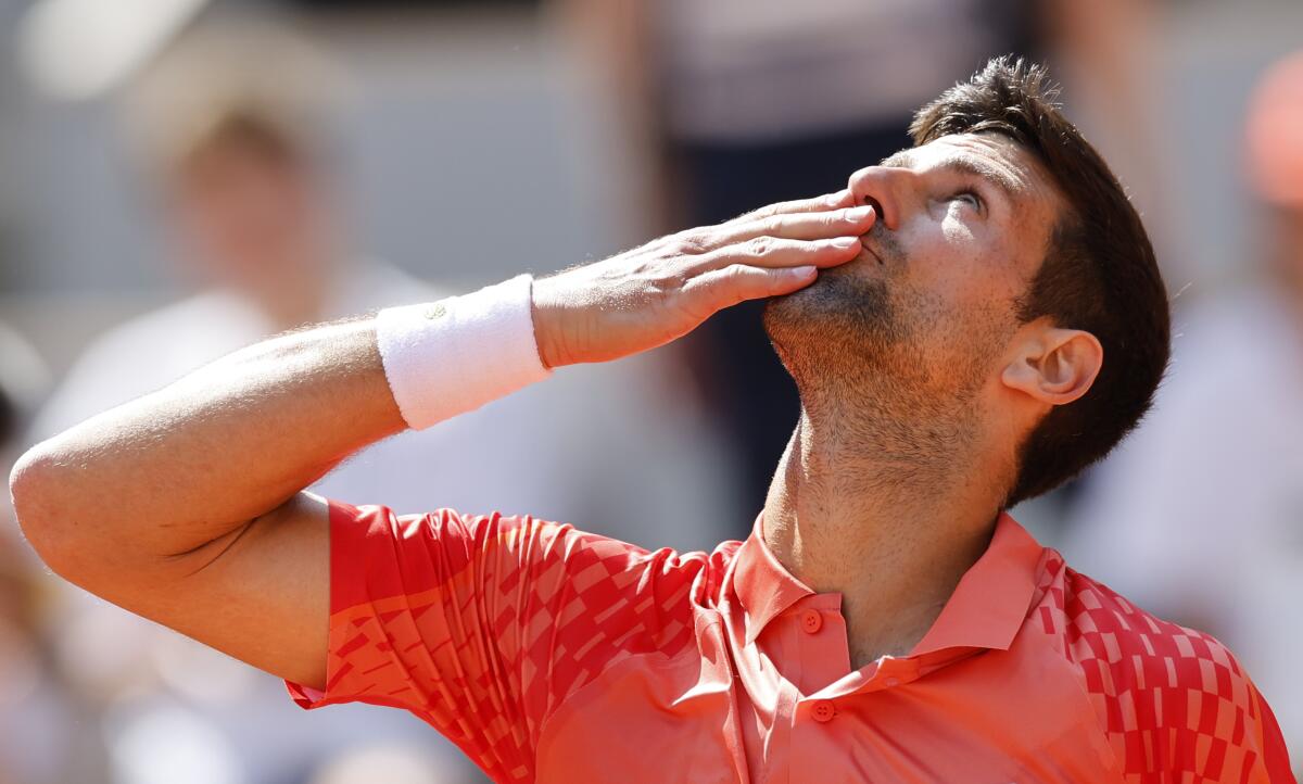 Serbia's Novak Djokovic celebrates after winning the first round match of the French Open