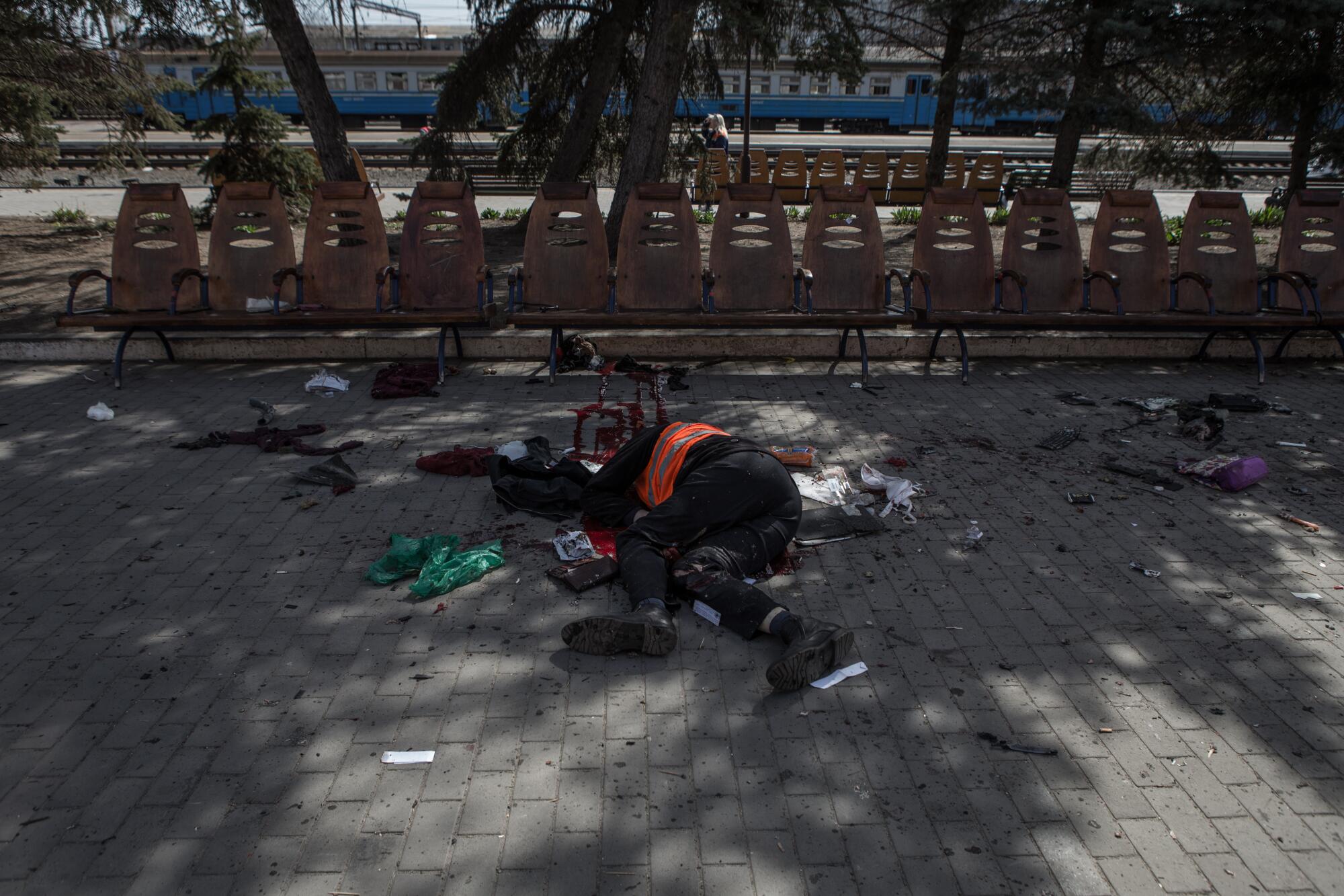 A body lies at the Kramatorsk train station in eastern Ukraine after Friday's Russian rocket attack.