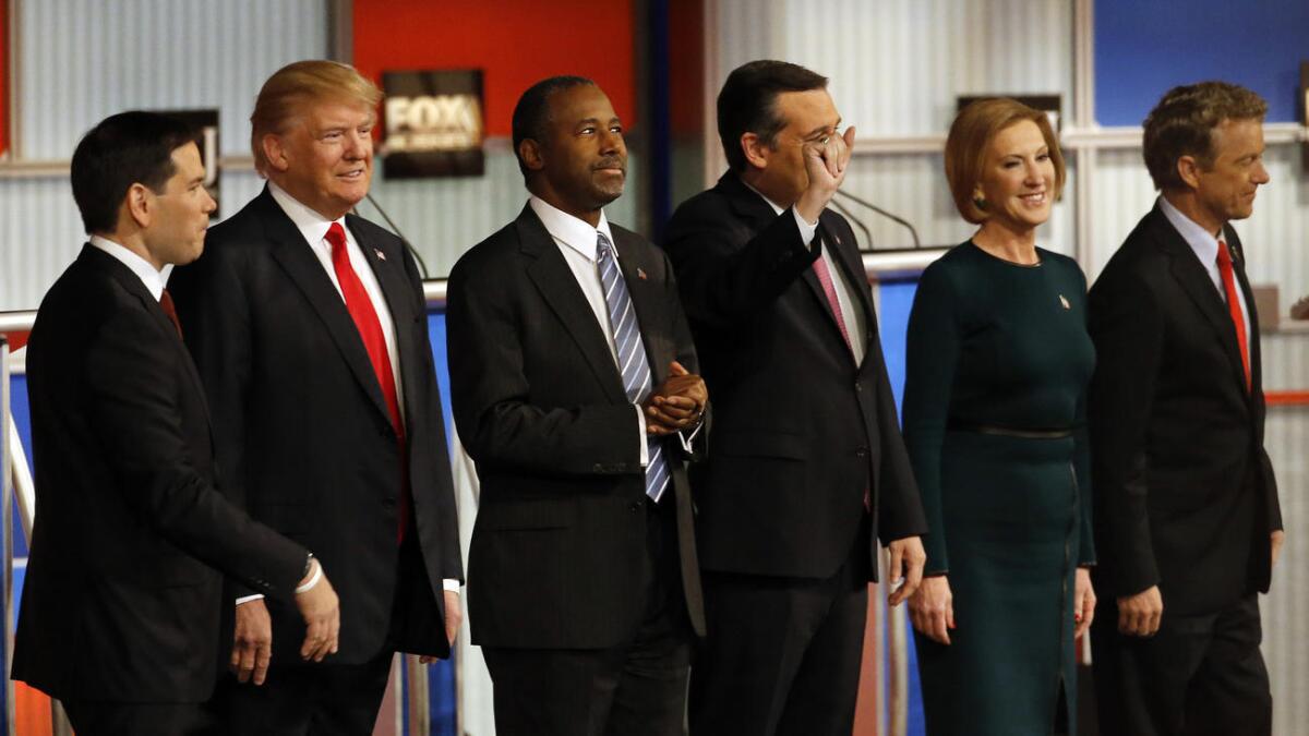 Republican presidential candidates take the stage during Republican presidential debate at Milwaukee Theatre.
