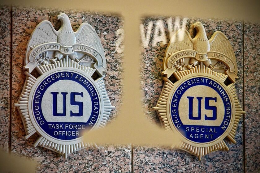 DEA badges are displayed at the DEA headquarters in Arlington, Virginia.