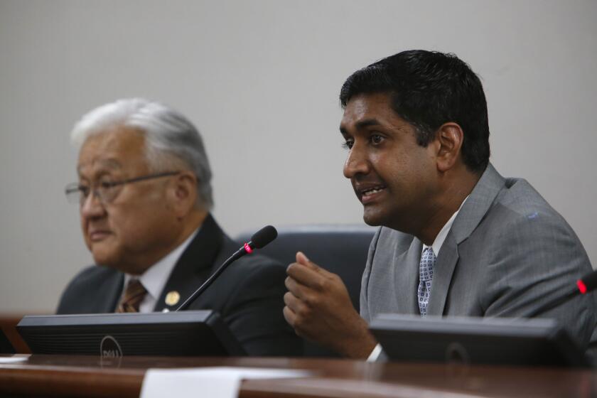 Democrat Ro Khanna, right, at a candidate forum in 2014 with Rep. Mike Honda of San Jose.