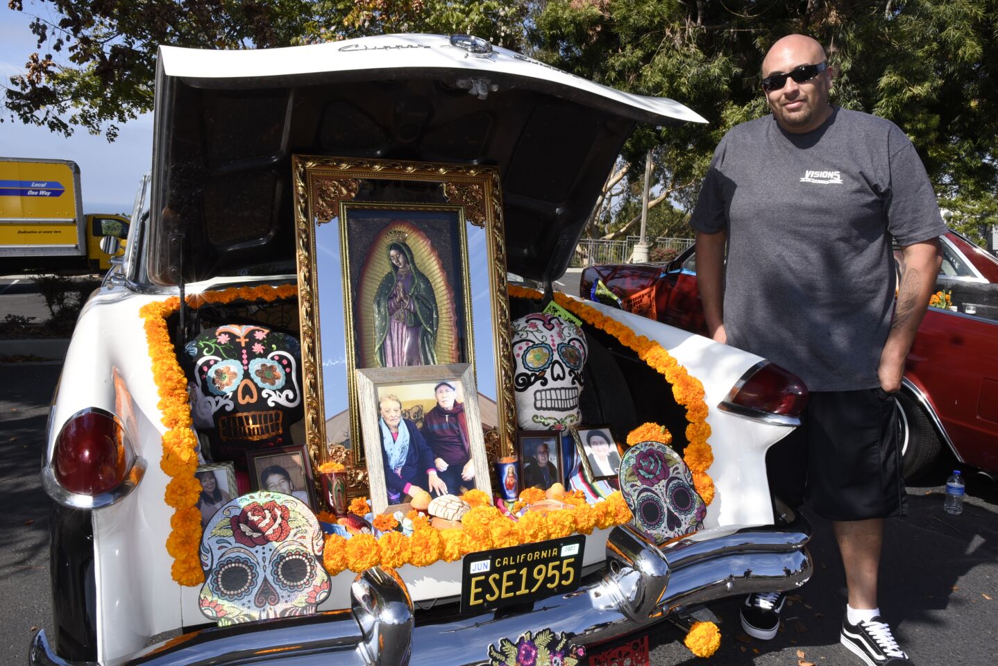 Esequiel Castrellon and the altar he created honoring his grandparents