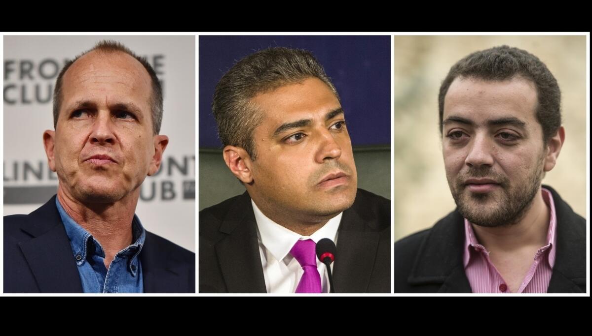 Al-Jazeera's Egyptian producer Baher Mohamed (right), Egyptian-Canadian reporter Mohamed Fahmy (center) and Australian journalist Peter Greste were sentenced by an Egyptian court to three years in prison on Aug. 29.