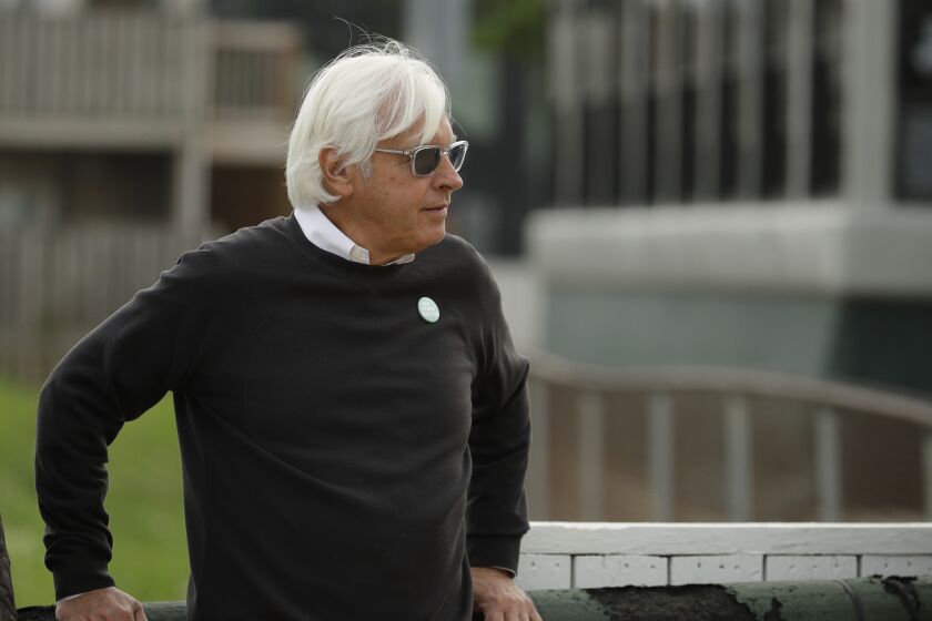 Trainer Bob Baffert watches his Kentucky Derby entrant Game Winner during a workout at Churchill Downs on May 1, 2019.