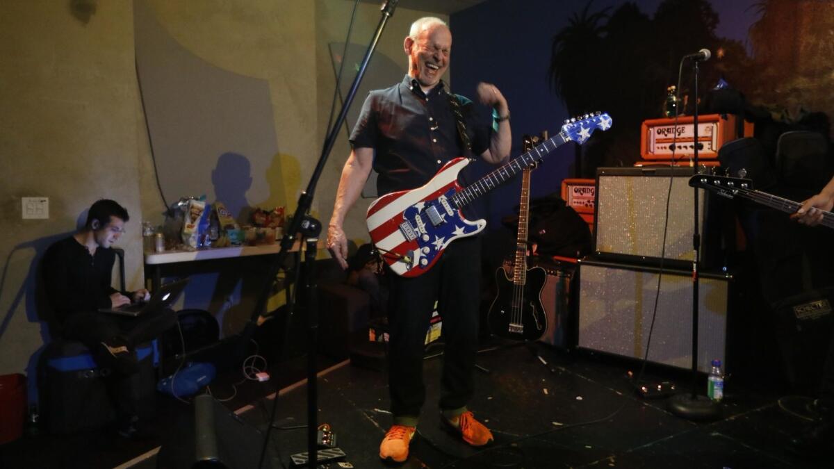 Wayne Kramer enjoys a light moment while rehearsing for his upcoming tour at Bedrock L.A. in Los Angeles.