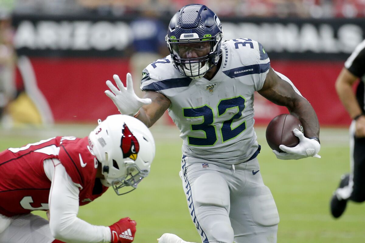 Seattle running back Chris Carson rushed for 104 yards in 22 carries in the Seahawks' 27-10 victory over the Arizona Cardinals on Sunday in Glendale, Ariz.