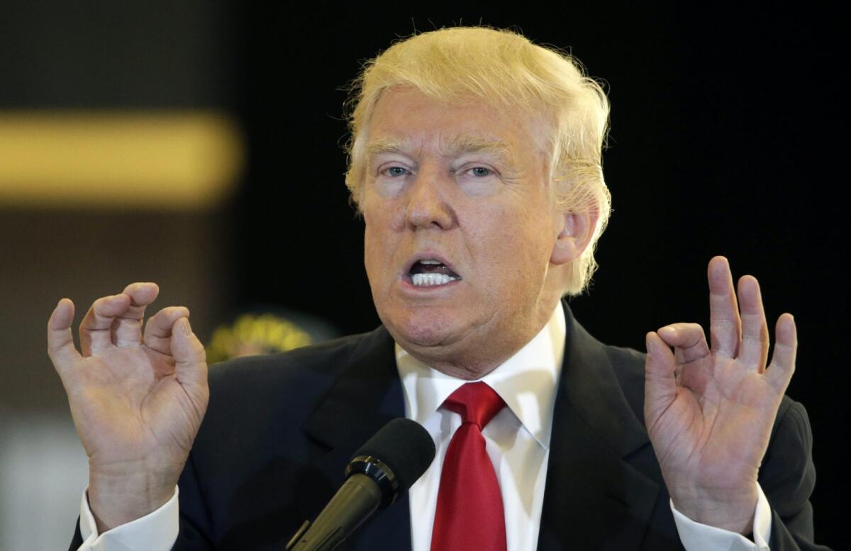 Republican presidential candidate Donald Trump talks to supporters and the media in the lobby of Trump Tower in New York on May 31.