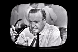 Screen capture of American broadcast journalist Walter Cronkite as he removes his glasses while announcing the death of President John F Kennedy as seen from a television monitor, November 22, 1963. (Photo by CBS Photo Archive/Getty Images)