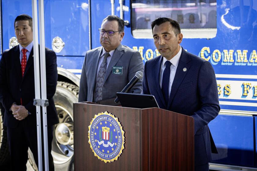 Los Angeles, CA - November 14: E. Martin Estrada, United States attorney for the Central District of California, speaks and is joined by federal and local law enforcement officials announcing a federal drug trafficking indictment targeting members and associates of a notorious transnational gang during a press conference in Los Angeles Tuesday, Nov. 14, 2023. (Allen J. Schaben / Los Angeles Times)
