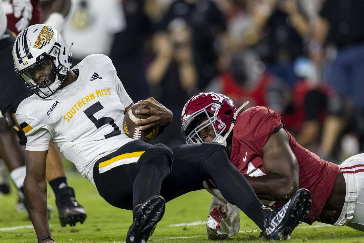 Alabama linebacker Will Anderson Jr. (31) sacks Southern Mississippi quarterback Ty Keyes (5) during the first half of an NCAA college football game, Saturday, Sept. 25, 2021, in Tuscaloosa, Ala. (AP Photo/Vasha Hunt)