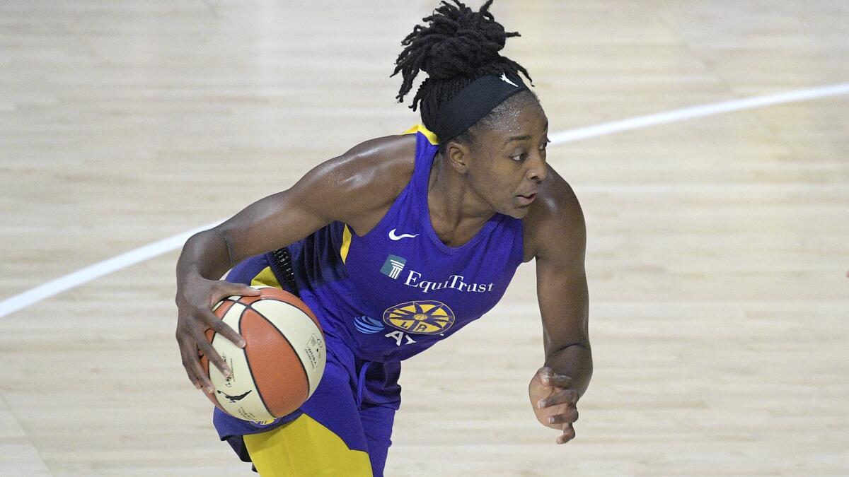 Sparks forward Nneka Ogwumike drives to the basket.