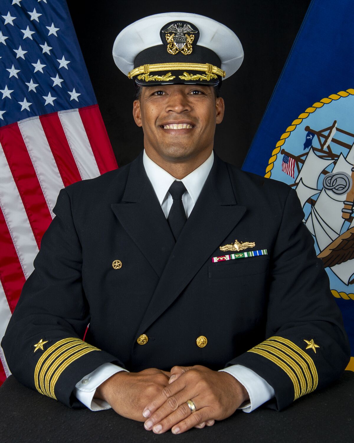 U.S. Navy Capt. Gervy Alota, commanding officer of the amphibious transport dock USS John P. Murtha.