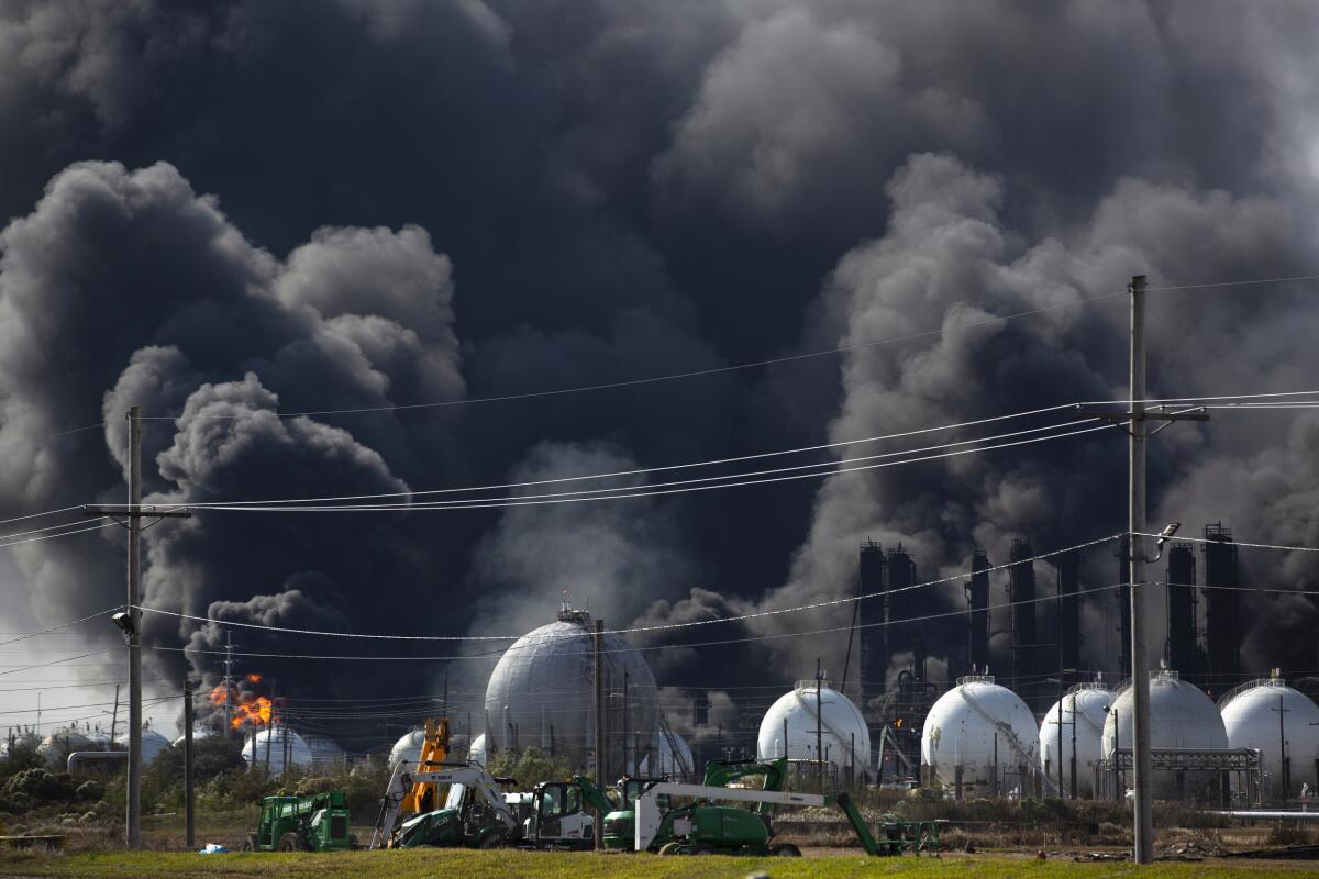 Smoke from an explosion at the TPC Group plant billows upward Wednesday in Port Neches, Texas.