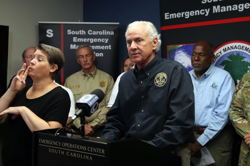 South Carolina Gov. Henry McMaster, along with other state officials, provides an update on Hurricane Ian at the South Carolina Emergency Operations Center in West Columbia, S.C., on Friday, Sept. 30, 2022. (AP Photo/James Pollard)