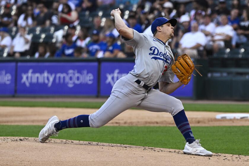 Los Angeles Dodgers pitcher Gavin Stone delivers during the first inning of the team's baseball game against the Chicago White Sox, Wednesday, June 26, 2024, in Chicago. (AP Photo/Matt Marton)