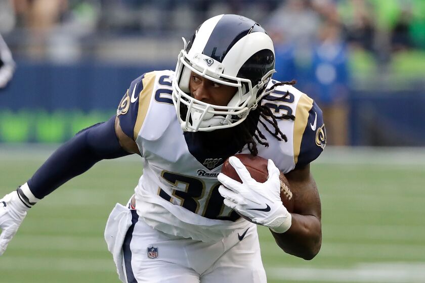 Los Angeles Rams running back Todd Gurley carries the ball during an NFL football game against the Seattle Seahawks, Thursday, Oct. 3, 2019, in Seattle. (AP Photo/Elaine Thompson)