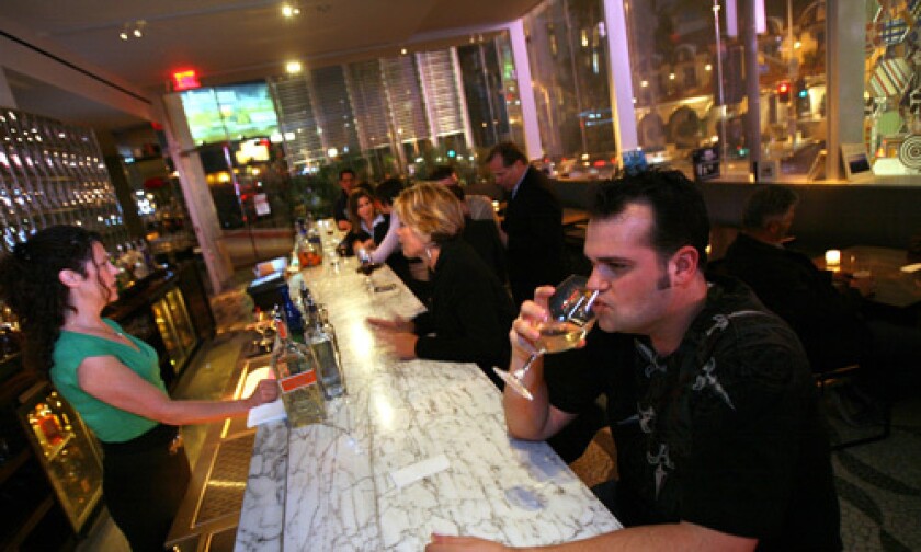 Matthew DeYoung, 29, drinks wine at RH in the Andaz West Hollywood.