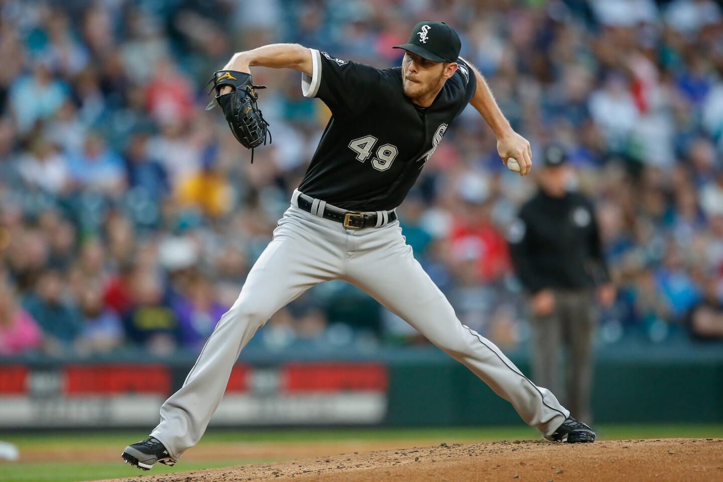 Starting pitcher Chris Sale of the White Sox pitches against the Seattle Mariners in the first inning.