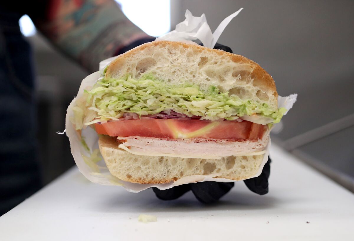 One of Laura Cahill's most popular sandwiches, the California Love, assembled at GEWL sandwich shop in Costa Mesa.