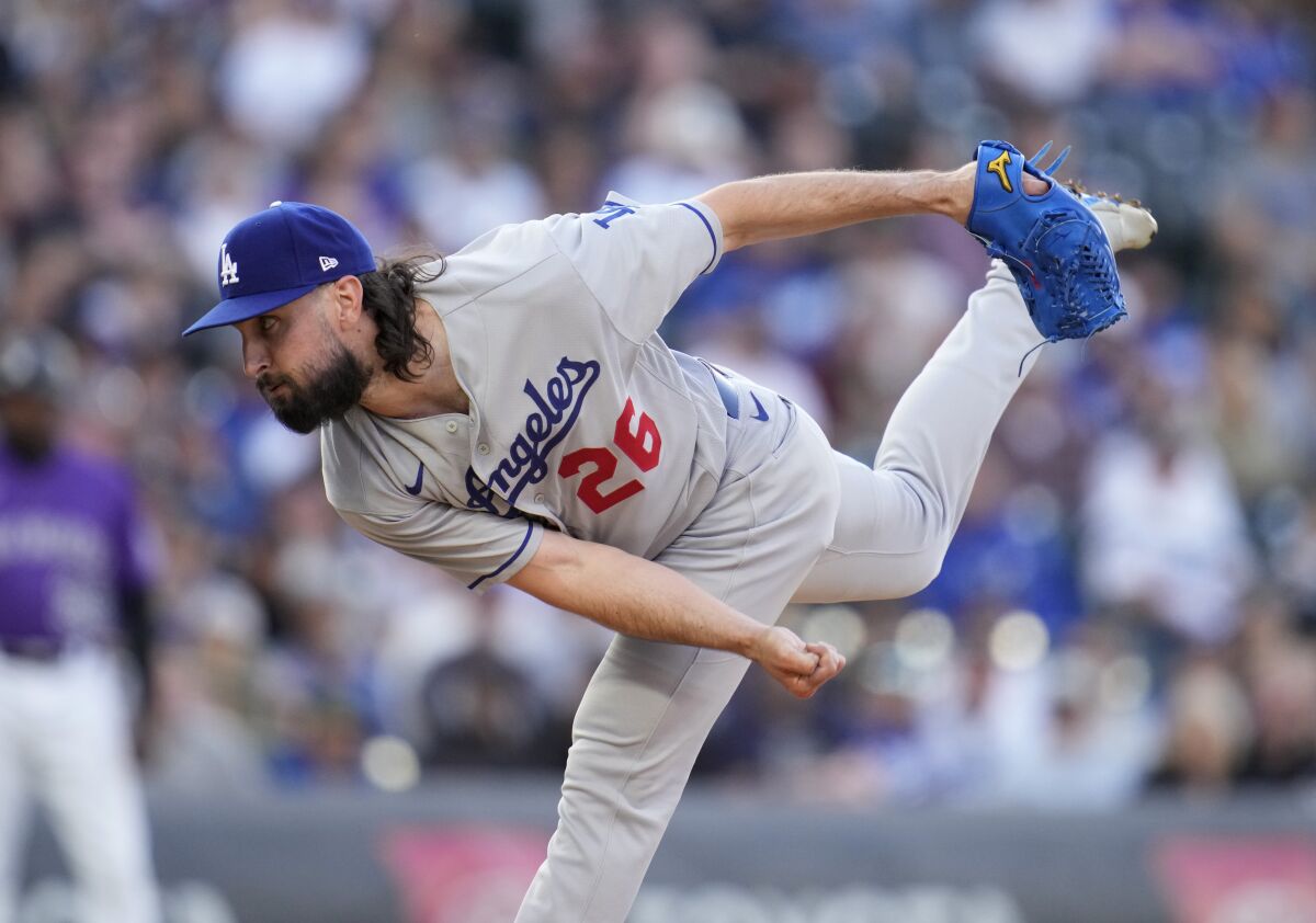 Los Angeles Dodgers starting pitcher Tony Gonsolin works against the Colorado Rockies.