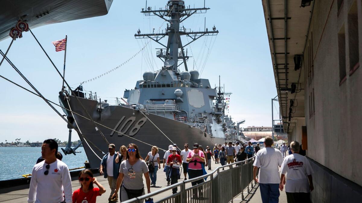 People flock to the warships such as the destroyer Wayne E. Meyer at last year's L.A. Fleet Week in San Pedro.