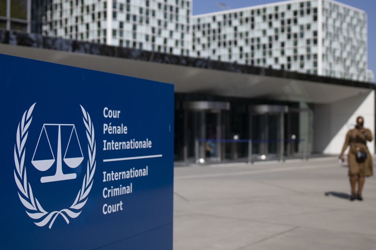 File - The exterior view of the International Criminal Court in The Hague, Netherlands, Wednesday, March 31, 2021. A Dutch intelligence agency said Thursday, June 16, 2022 that it prevented a Russian spy using a false Brazilian identity from working as an intern at the International Criminal Court, which is investigating allegations of Russian war crimes in Ukraine. (AP Photo/Peter Dejong, File)