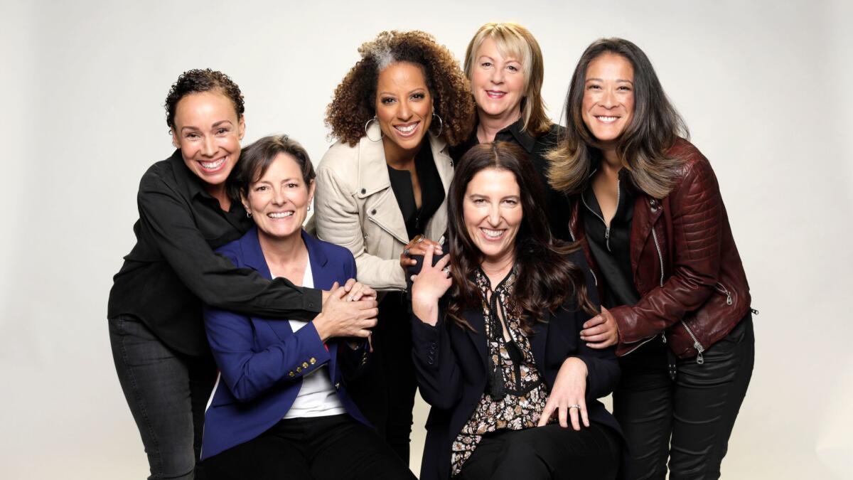 LOS ANGELES, CALIF. - NOVEMBER 12, 2017: "Jessica Jones" female directors: (Left to right) Zetna Fuentes, Mairzee Almas, Millicent Shelton, Liz Friedlander (seated), Rosemary Rodriguez, Jet Wilkinson. (Myung J. Chun / Los Angeles Times)