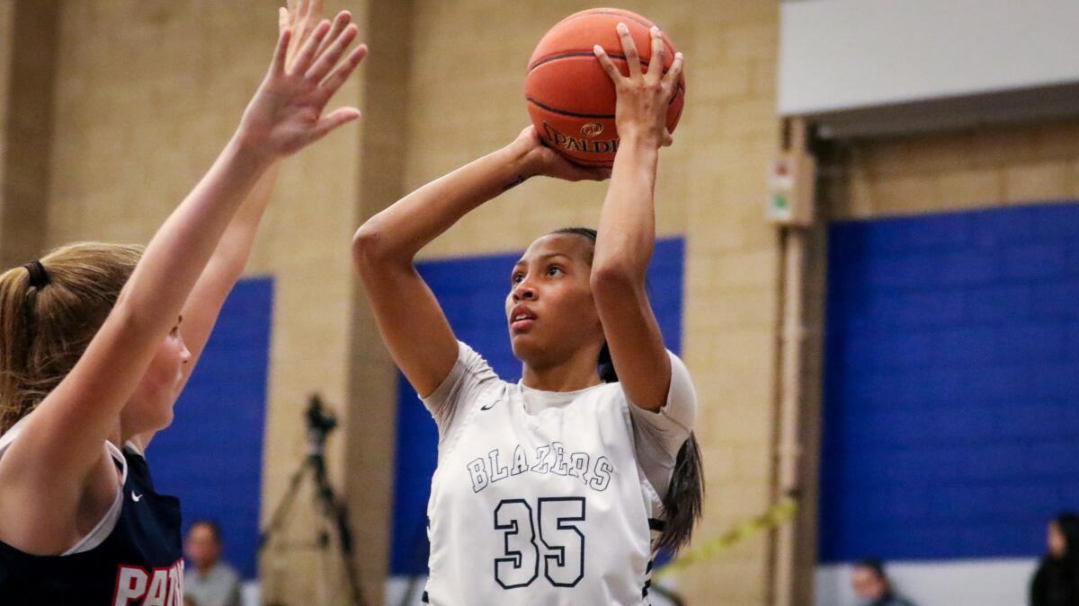 Sierra Canyon's Alexis Mark shoots a baseline jumper over a Viewpoint defender during the Trailblazers' 71-49 victory on Wednesday.