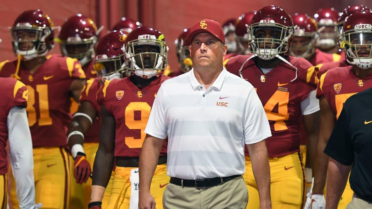 USC head coach Clay Helton will try to turn things around when the Trojans take on Washington State on Friday.